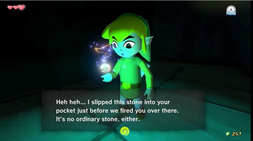 Link encontrando el colgante con la gema en el Wind Waker.